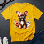 Yellow t-shirt with a puppy graphic on a dark surface