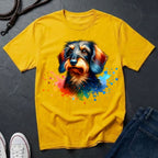 Yellow t-shirt with a colorful dog graphic on a dark surface