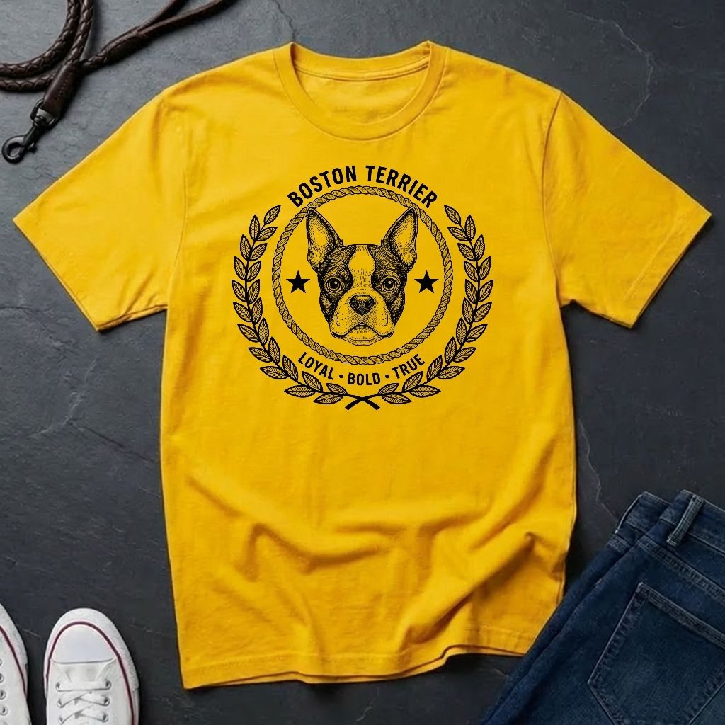 Yellow Comfort Colors t-shirt with Boston Terrier graphic and text on a dark surface with jeans and shoes.