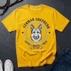 Yellow Comfort Colors t-shirt with German Shepherd design and text on a dark surface