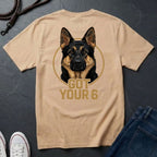 Beige Comfort Colors t-shirt with a German Shepherd graphic and 'Got Your 6' text on a dark surface.