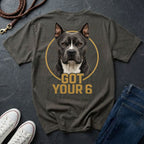 Gray Comfort Colors t-shirt with a dog graphic and 'GOT YOUR 6' text on a dark surface with shoes and jeans.