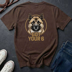 Brown Comfort Colors t-shirt with a dog graphic and 'Got Your 6' text on a dark surface with shoes and jeans.
