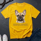 Yellow Comfort Colors t-shirt with a dog graphic and text on a dark surface