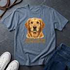 Blue Comfort Colors t-shirt with a Golden Retriever graphic and text on a dark surface with shoes and jeans.