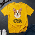 Yellow Comfort Colors t-shirt with a corgi graphic and text on a dark surface