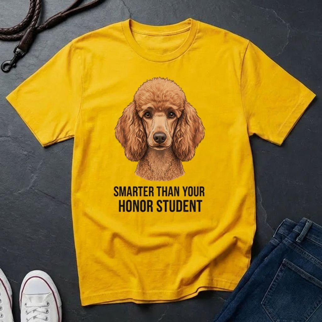 Yellow Comfort Colors t-shirt with a dog illustration and text on a dark surface