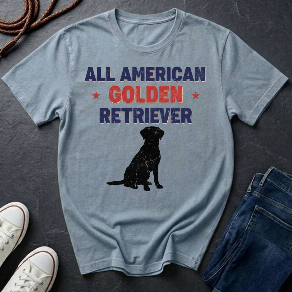 Gray Comfort Colors t-shirt with 'All American Golden Retriever' text and dog silhouette on a dark surface.