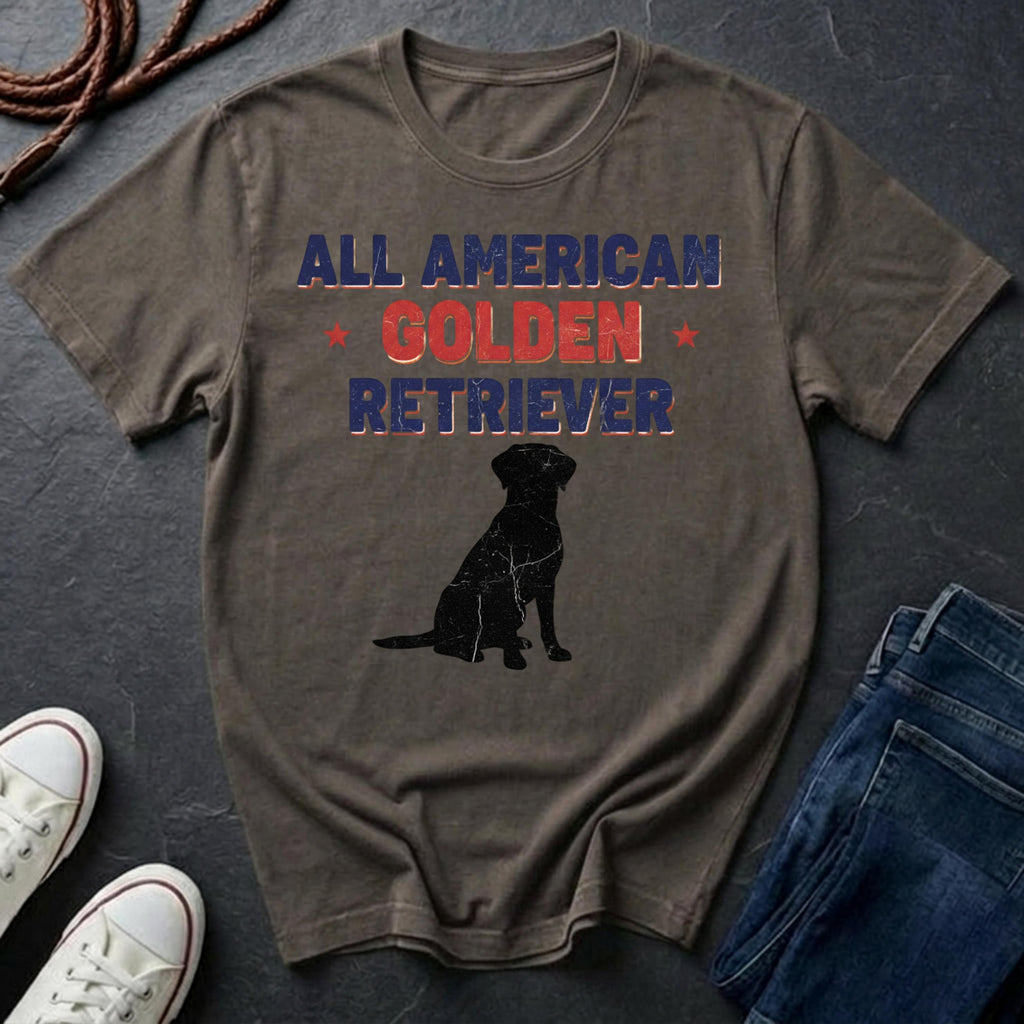 Brown Comfort Colors t-shirt with 'All American Golden Retriever' text and dog silhouette on a dark surface.