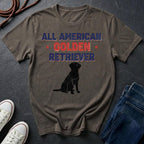 Brown Comfort Colors t-shirt with 'All American Golden Retriever' text and dog silhouette on a dark surface.