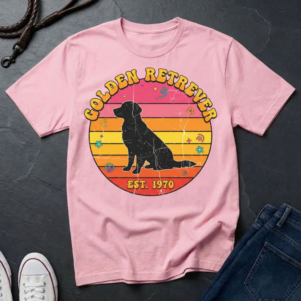 Pink Comfort Colors t-shirt with Golden Retriever design on a dark surface