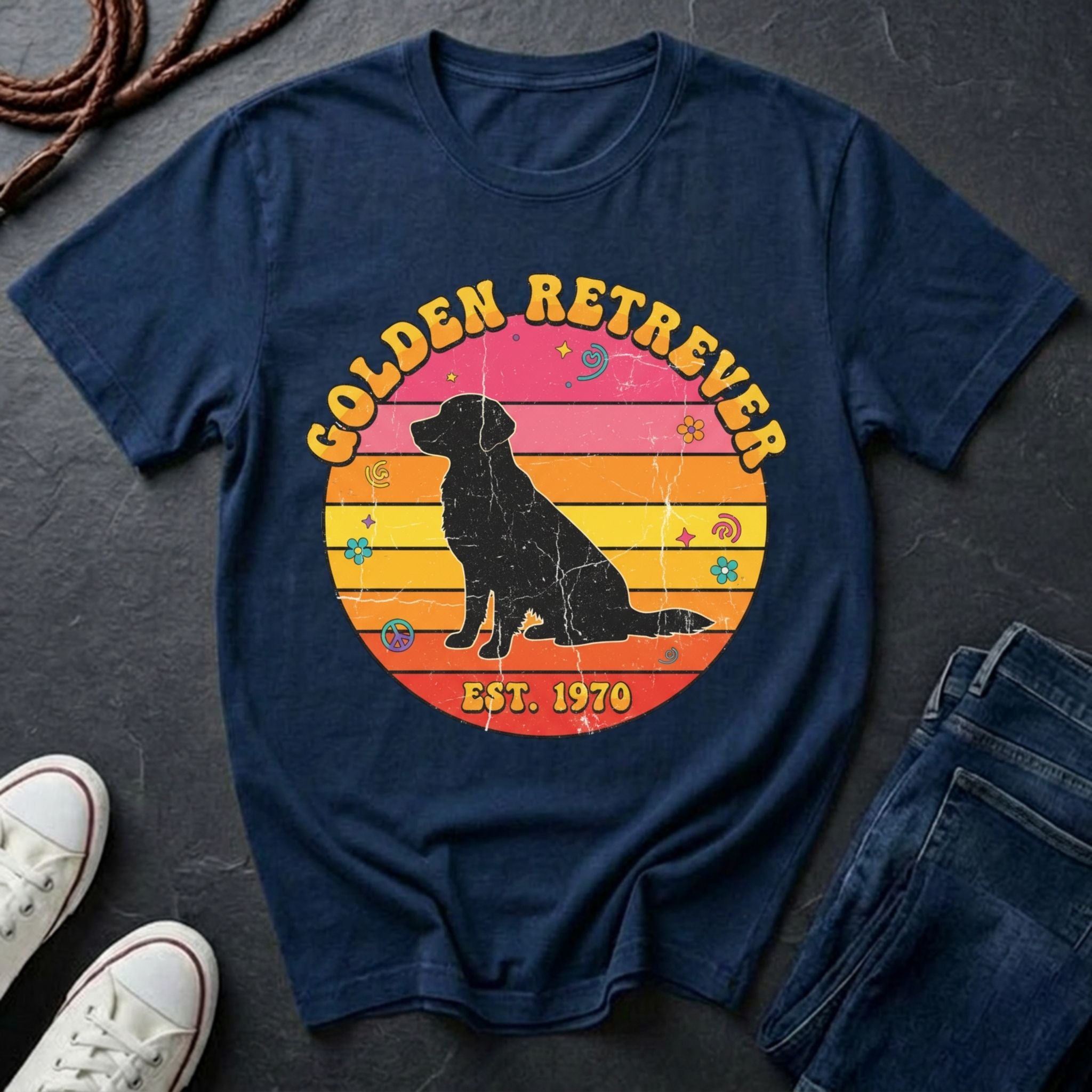 Navy blue Comfort Colors t-shirt with a Golden Retriever graphic and text on a dark surface.