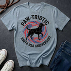 Gray Comfort Colors t-shirt with 'Paw-Triotic 250th USA Anniversary' design featuring a dog silhouette on a dark surface.