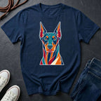 Doberman Pop Art t-shirt design featuring colorful graphic dog portrait on navy Comfort Colors tee