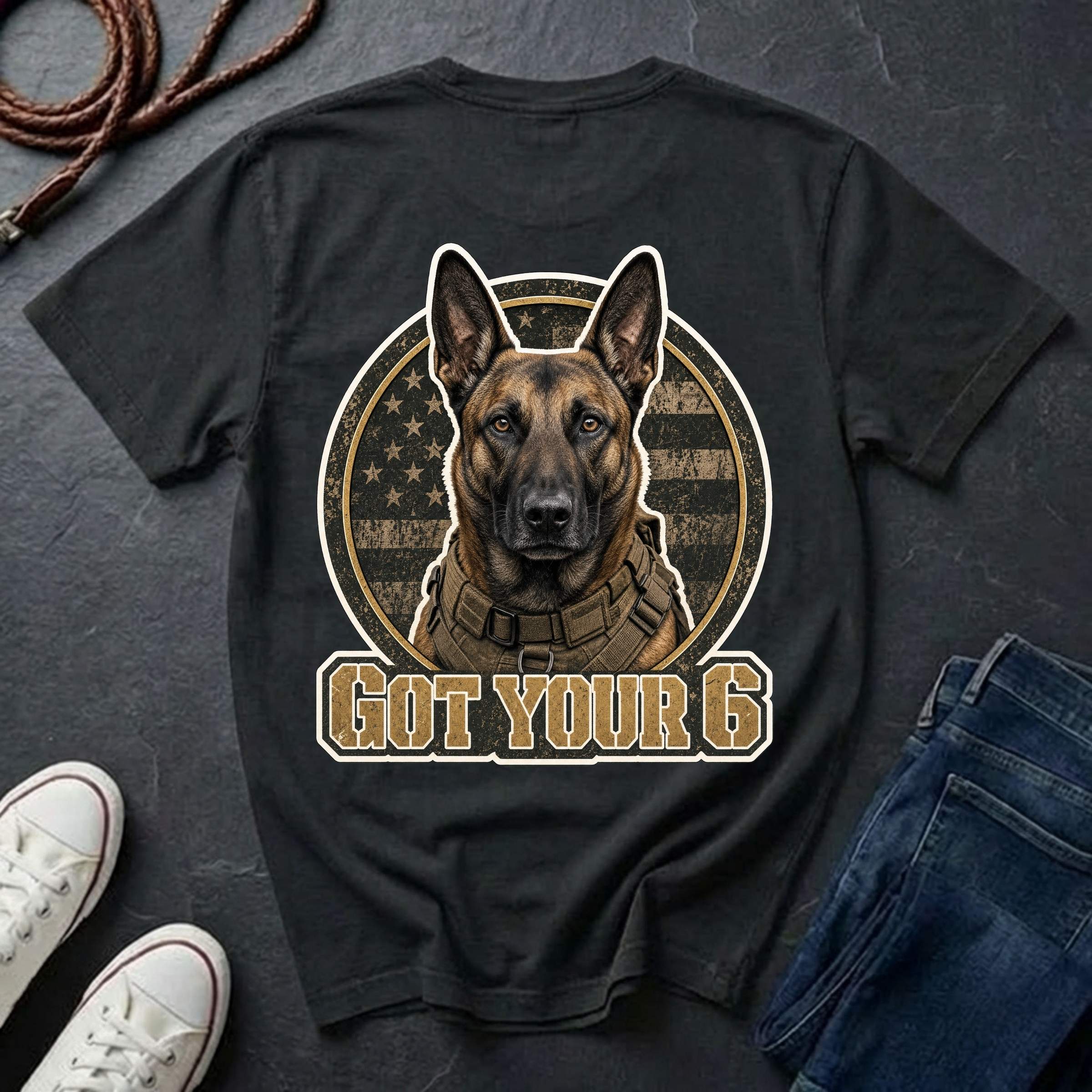 Belgian Malinois illustration inside a circular American flag design with the text 'GOT YOUR 6' below, on a black comfort color tee