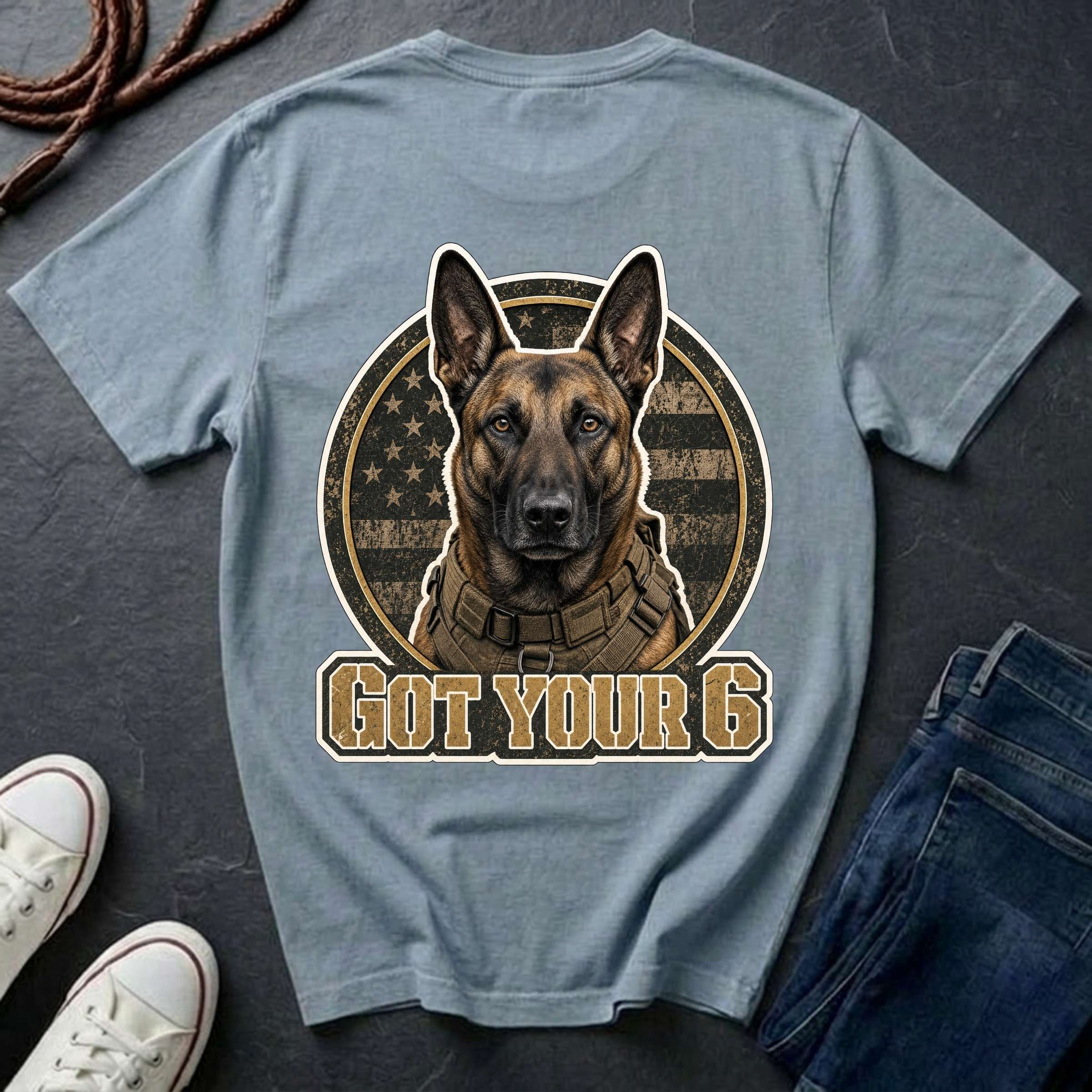 Belgian Malinois illustration inside a circular American flag design with the text 'GOT YOUR 6' below, on a chambray comfort color tee