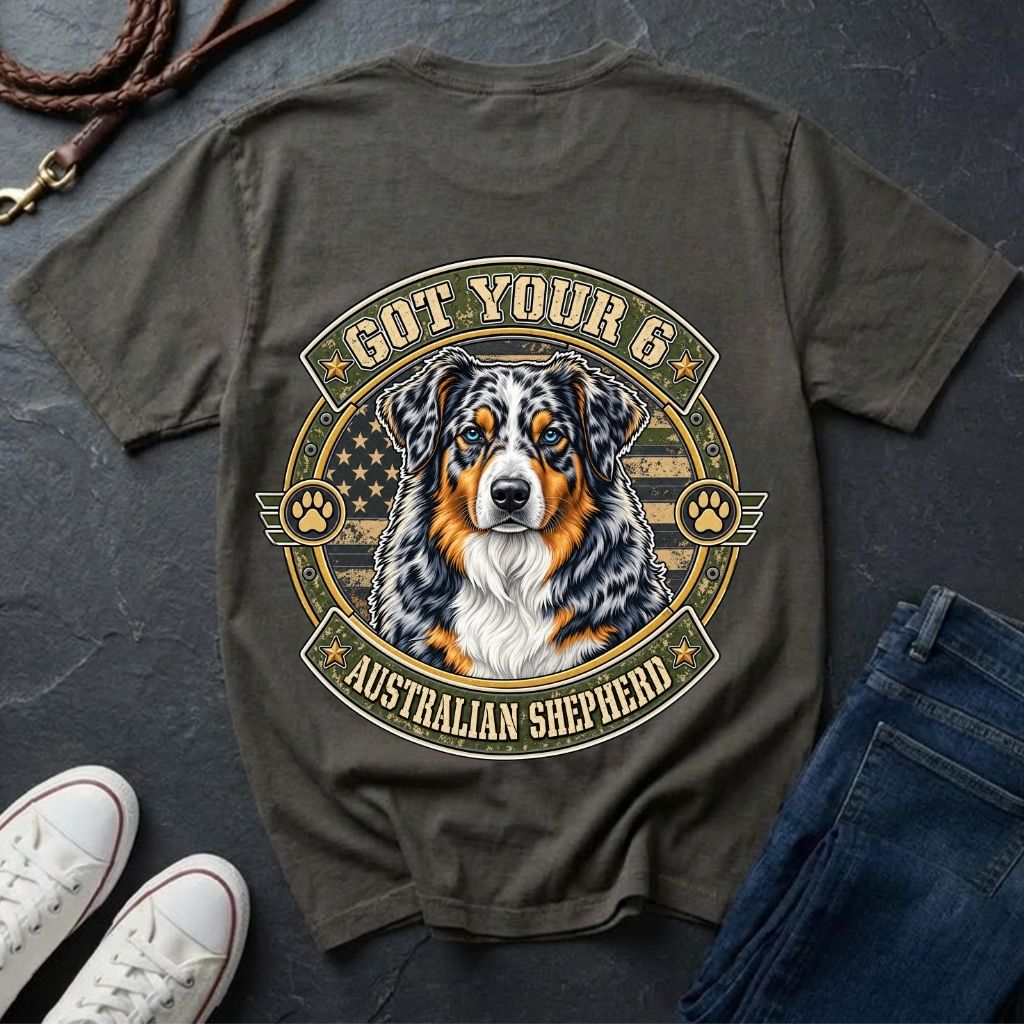 Australian Shepherd Got Your 6 t-shirt design featuring a tactical distressed badge with blue merle Australian Shepherd portrait and American flag on Comfort Colors tee in pepper